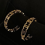 CHANEL Earrings Gold 21A CC Dangle Hoops Earrings Gold -Knockoff
