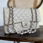 CHANEL Handbag 20B Ivory Caviar Quilted Classic Flap Medium Silver Hardware -Knockoff
