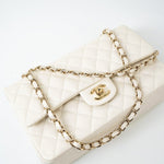 CHANEL Handbag 21A White/ Ivory Caviar Quilted Classic Flap Medium Light Gold Hardware -Knockoff
