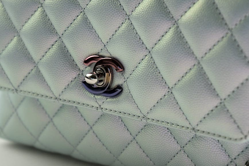 CHANEL Handbag 21K Iridescent Blue Caviar Quilted Coco Handle Small -Knockoff
