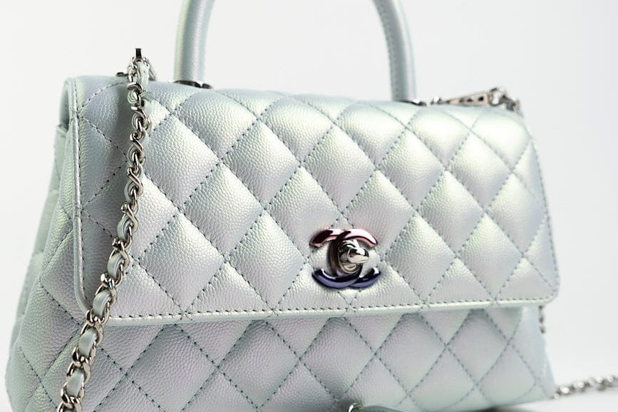 CHANEL Handbag 21K Iridescent Blue Caviar Quilted Coco Handle Small -Knockoff
