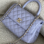 CHANEL Handbag 21K Quilted Coco Handle Lilac Caviar Small LGHW -Knockoff
