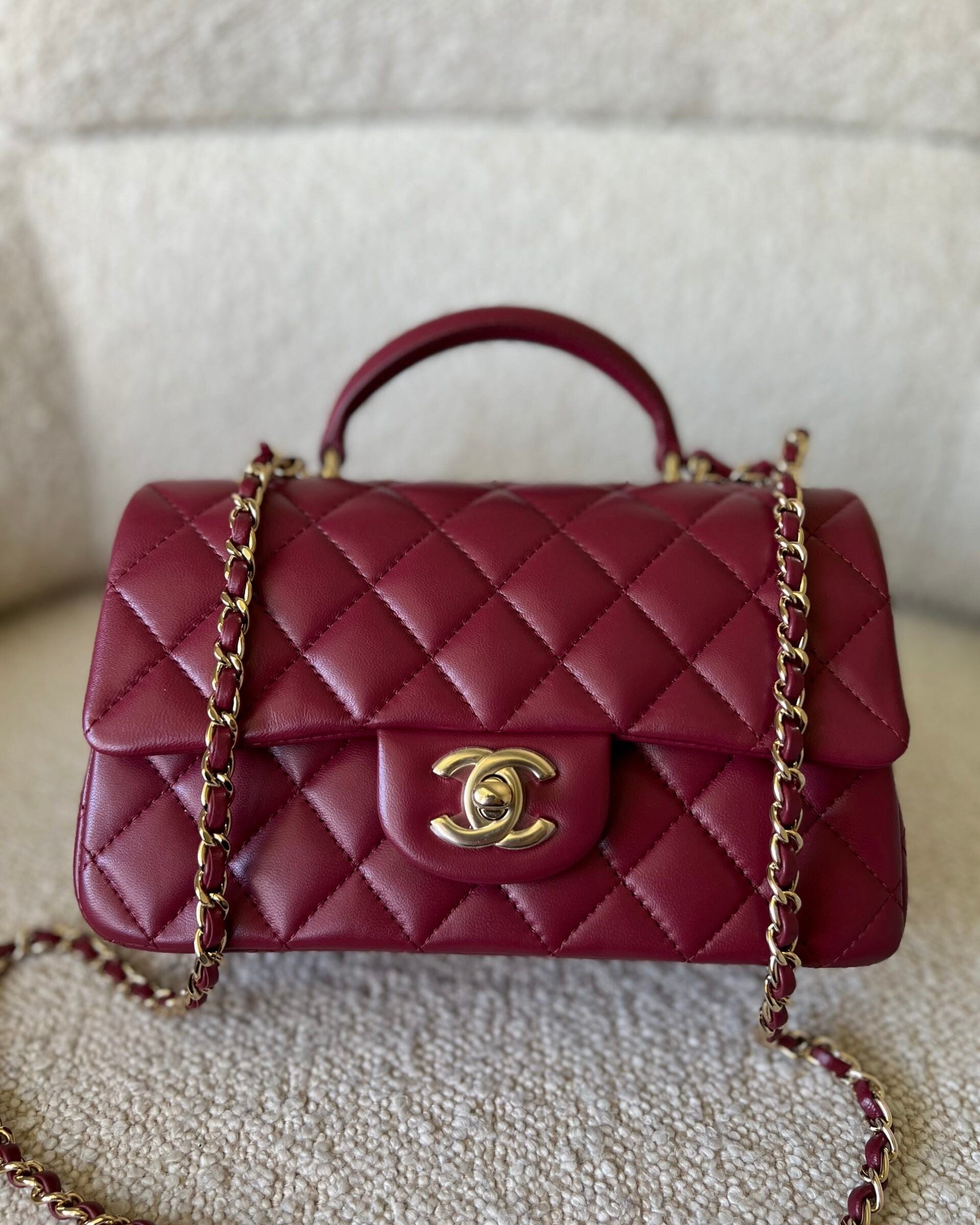 CHANEL Handbag 22A Mini Burgundy Lambskin Quilted Single Flap with Top handle Light Gold Hardware -Knockoff
