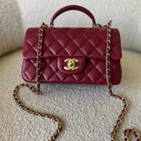 CHANEL Handbag 22A Mini Burgundy Lambskin Quilted Single Flap with Top handle Light Gold Hardware -Knockoff
