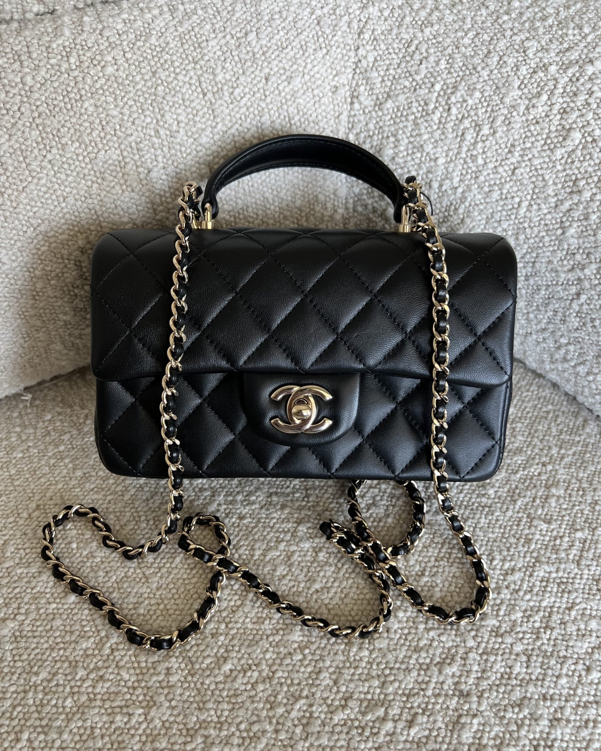 CHANEL Handbag 22P Black Lambskin Quilted Mini Top Handle LGHW -Knockoff
