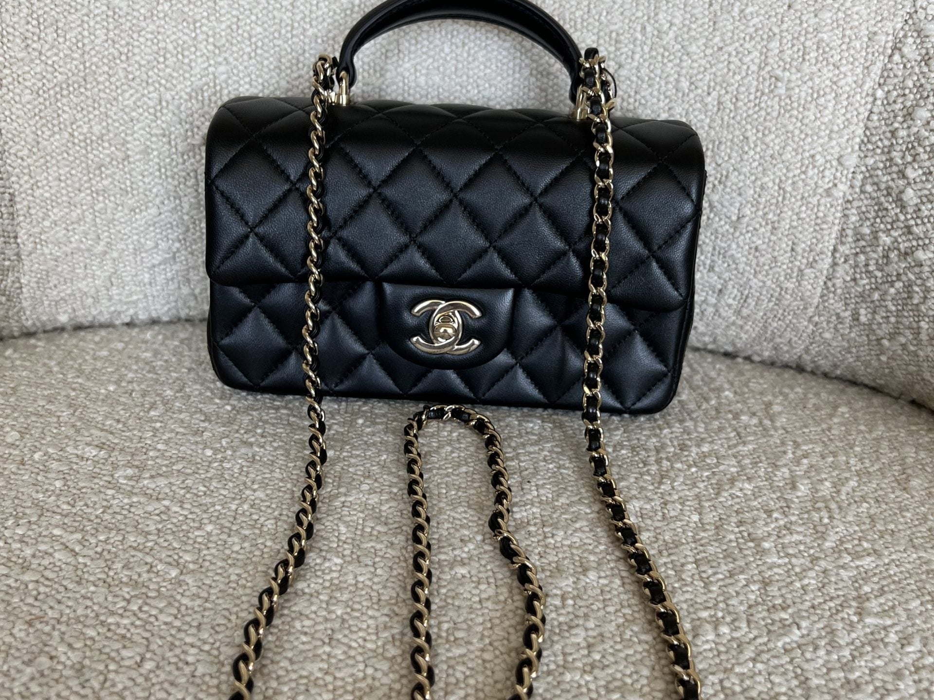 CHANEL Handbag 22P Black Lambskin Quilted Mini Top Handle LGHW -Knockoff
