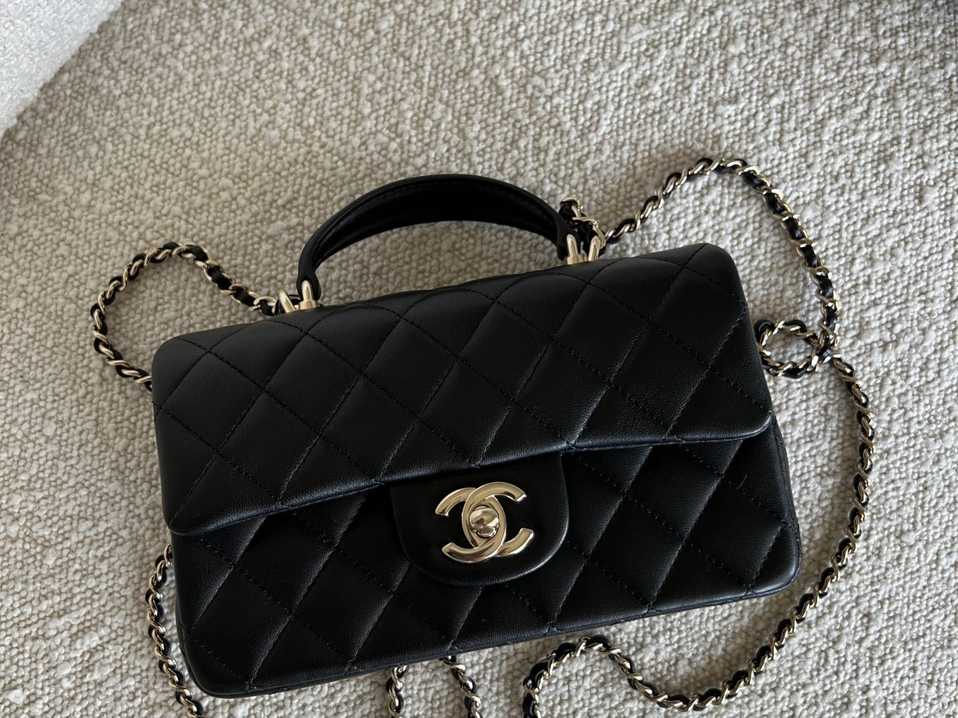 CHANEL Handbag 22P Black Lambskin Quilted Mini Top Handle LGHW -Knockoff
