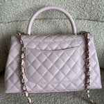 CHANEL Handbag 22P Light Pink Caviar Quilted Coco Handle Medium LGHW -Knockoff
