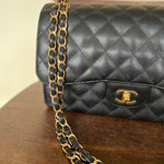 CHANEL Handbag Black Black Caviar Quilted Jumbo Classic Flap Gold Hardware -Knockoff
