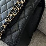 CHANEL Handbag Black Chanel Black Caviar Quilted Jumbo Classic Flap GHW -Knockoff
