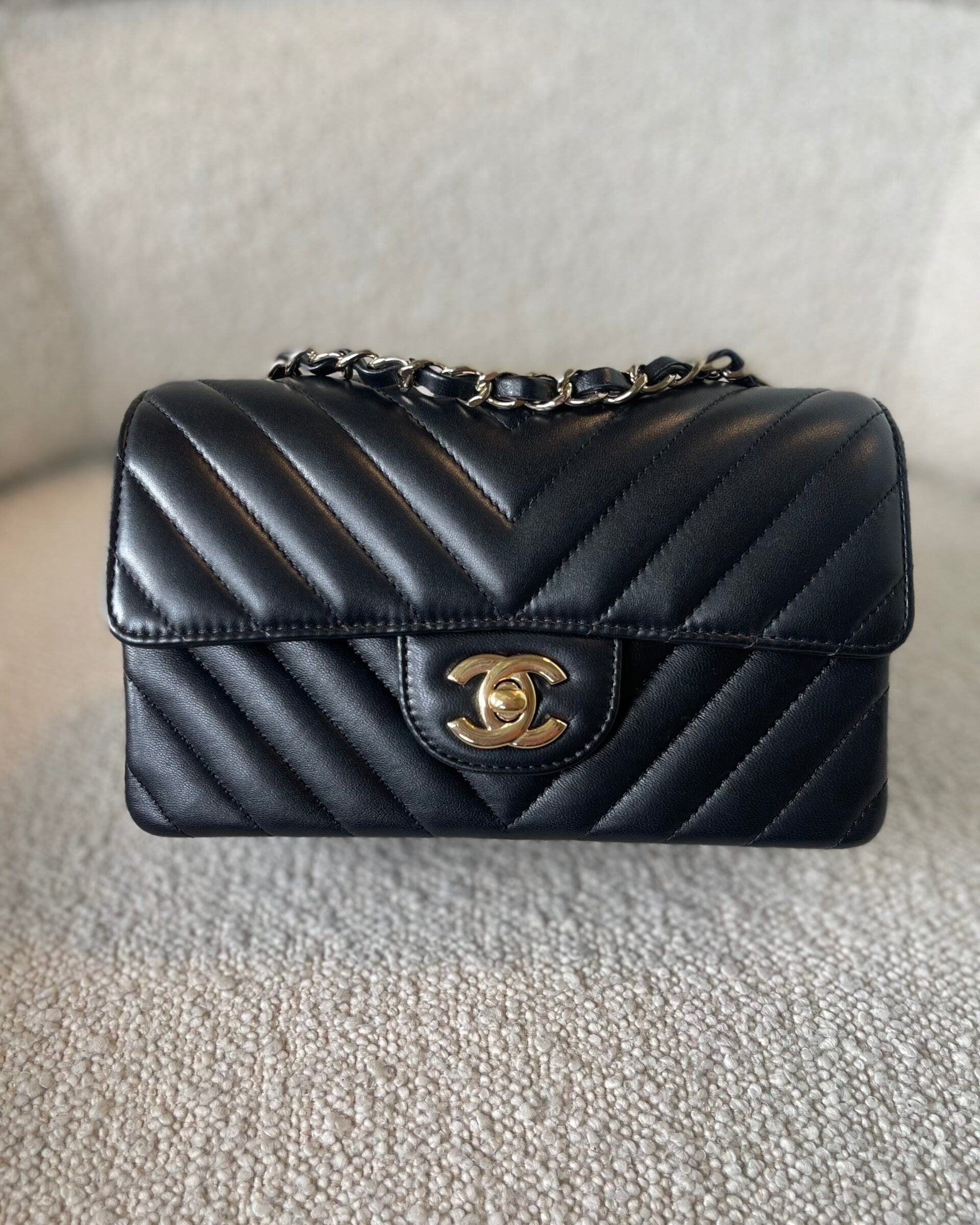 CHANEL Handbag Black Mini Rectangular Lambskin Chevron Light Gold Hardware -Knockoff
