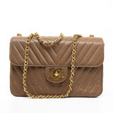 CHANEL Handbag Brown Taupe Caviar Chevron Maxi Single Flap 24K Gold Hardware -Knockoff
