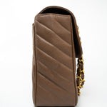 CHANEL Handbag Brown Taupe Caviar Chevron Maxi Single Flap 24K Gold Hardware -Knockoff
