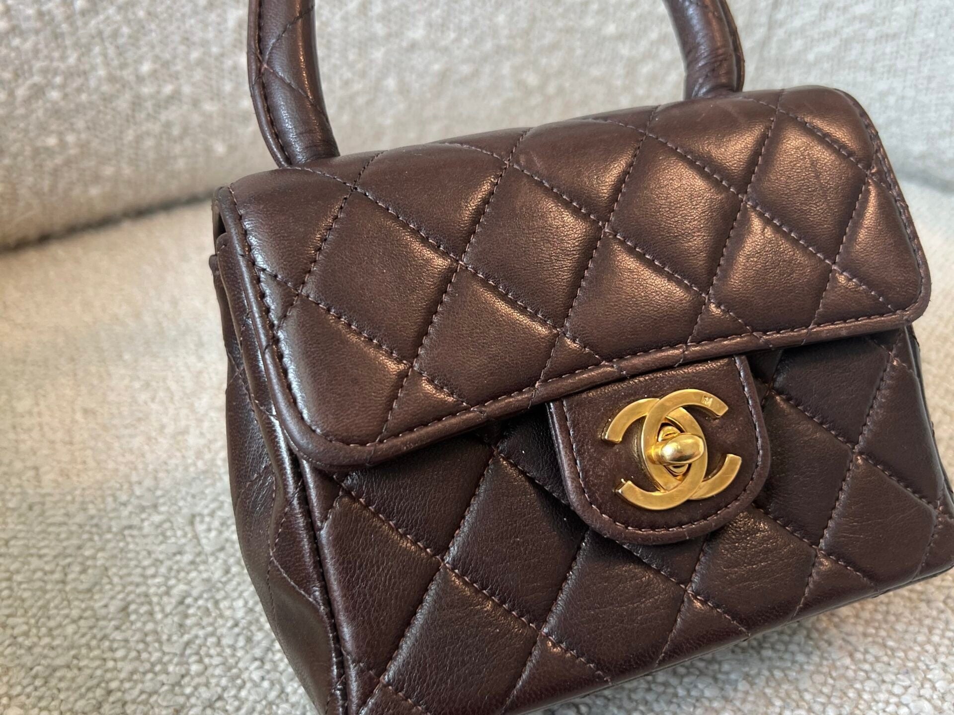 CHANEL Handbag Brown Vintage Brown Lambskin Quilted Micro Mini Kelly with Top Handle GHW -Knockoff
