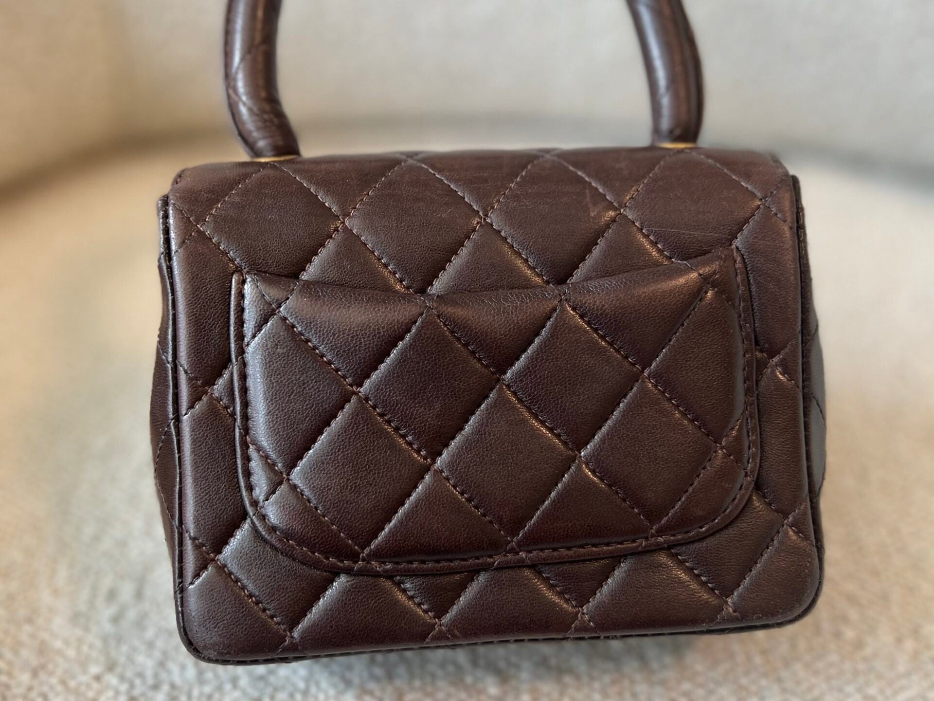 CHANEL Handbag Brown Vintage Brown Lambskin Quilted Micro Mini Kelly with Top Handle GHW -Knockoff
