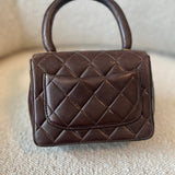 CHANEL Handbag Brown Vintage Brown Lambskin Quilted Micro Mini Kelly with Top Handle GHW -Knockoff
