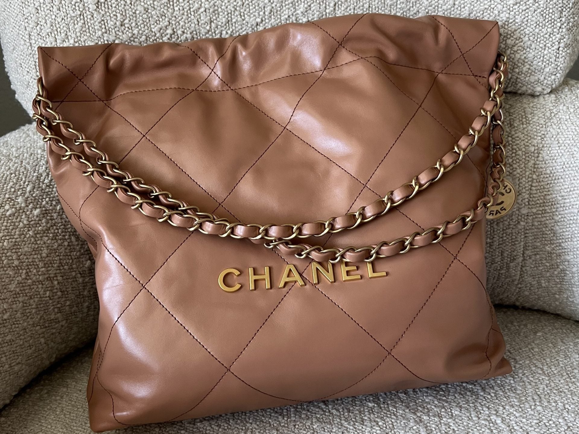 CHANEL Handbag Caramel Shiny Calfskin Quilted 22 Drawstring Bag Small GHW -Knockoff
