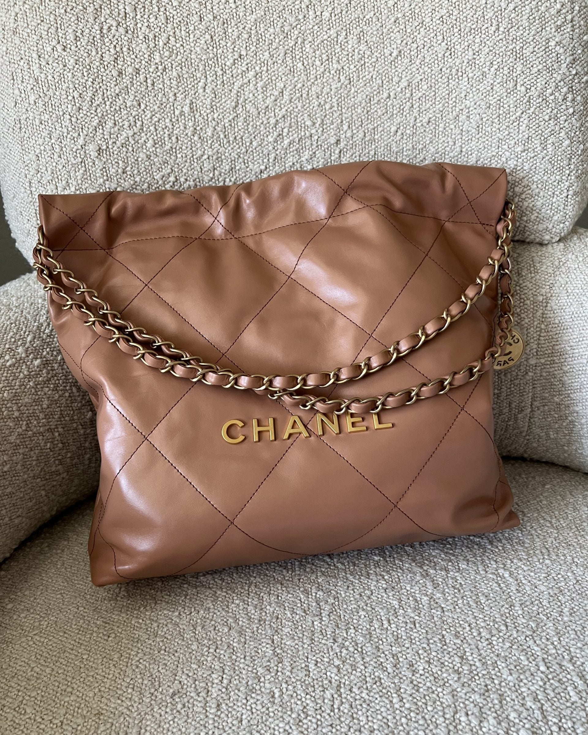 CHANEL Handbag Caramel Shiny Calfskin Quilted 22 Drawstring Bag Small GHW -Knockoff
