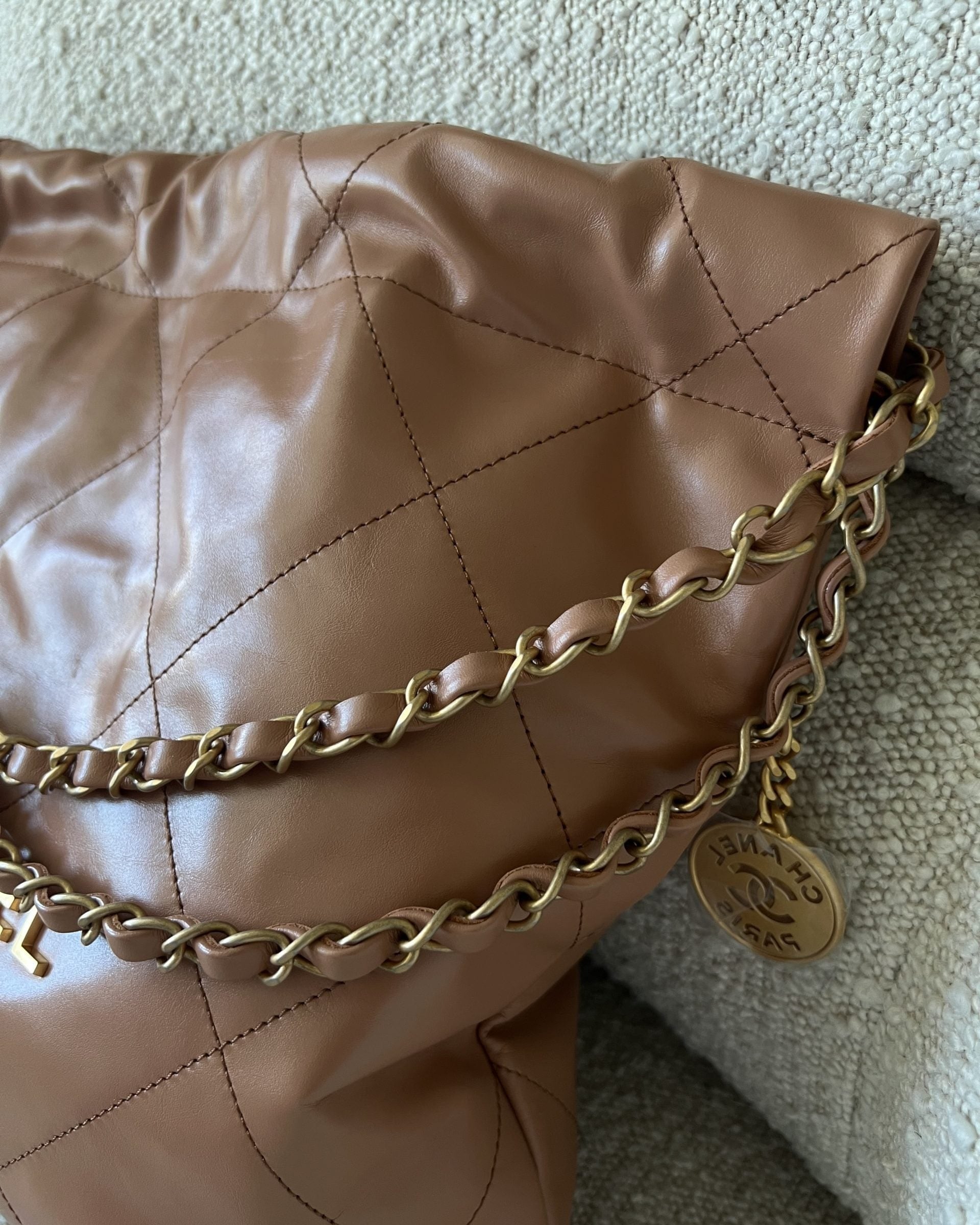 CHANEL Handbag Caramel Shiny Calfskin Quilted 22 Drawstring Bag Small GHW -Knockoff
