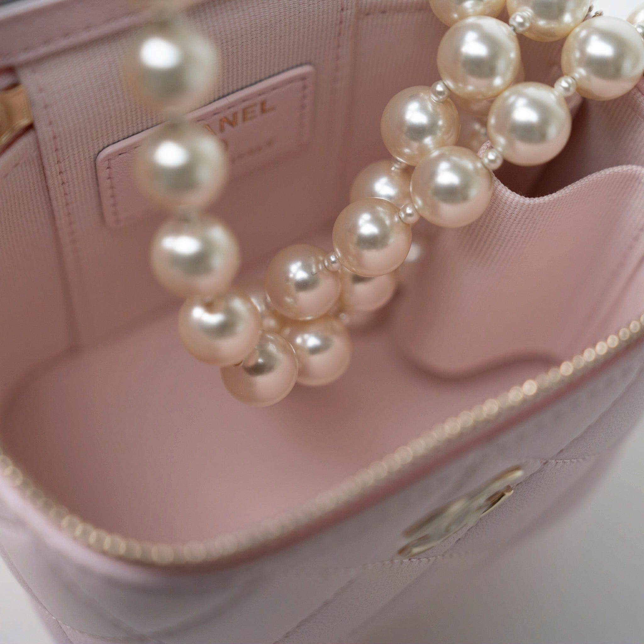 CHANEL Handbag Pink Light Pink Lambskin Quilted Mini Vanity Case With Pearl Chain -Knockoff
