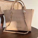 CHANEL Tote CHANEL LIGHT BEIGE MEDIUM DEAUVILLE SHOPPING TOTE STUDDED AGED HARDWARE -Knockoff
